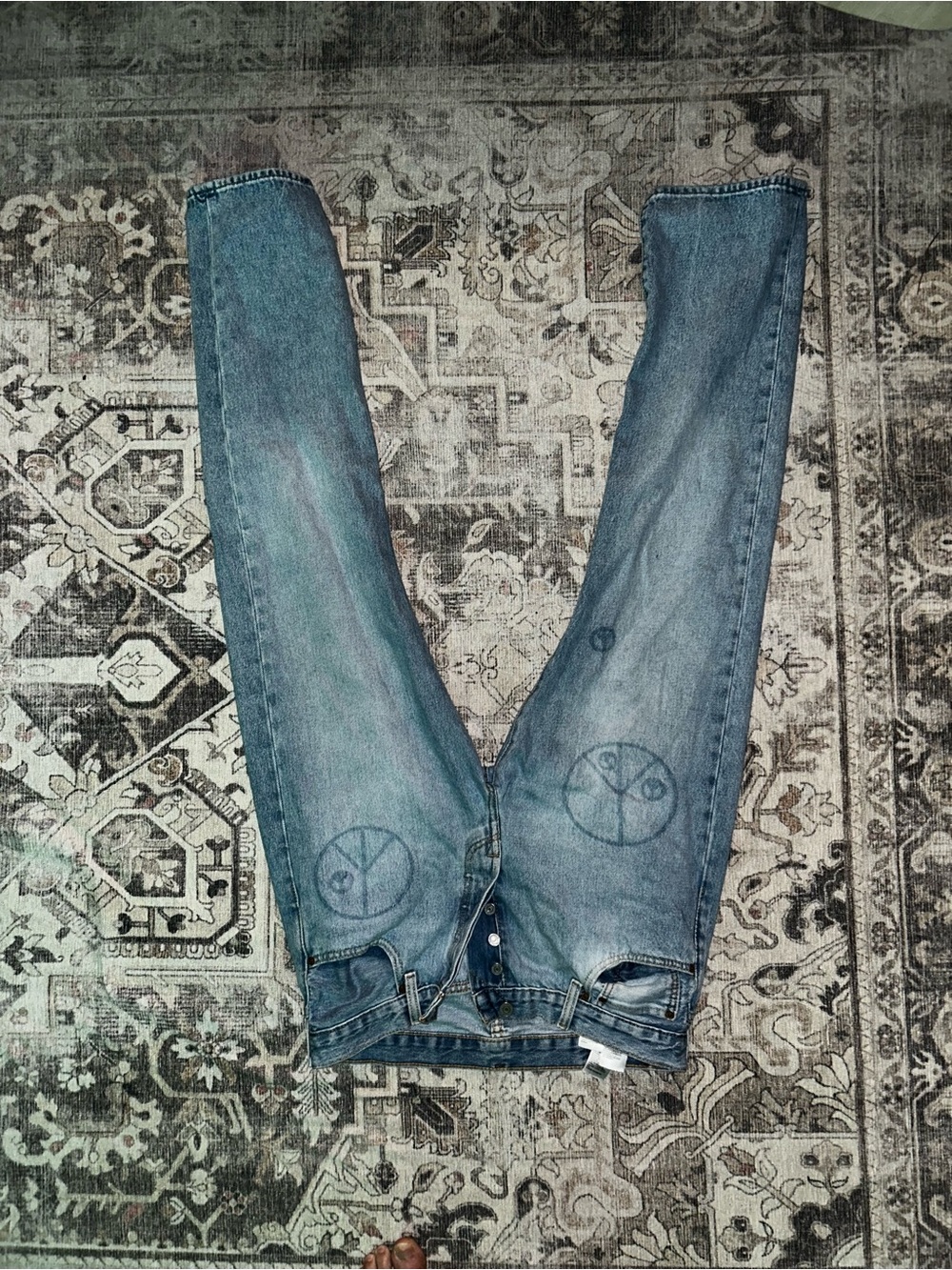 Levi's 501 150th anniversary edition. Peace symbol accents.